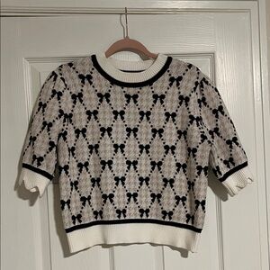 Cute scalloped sleeved bow sweater